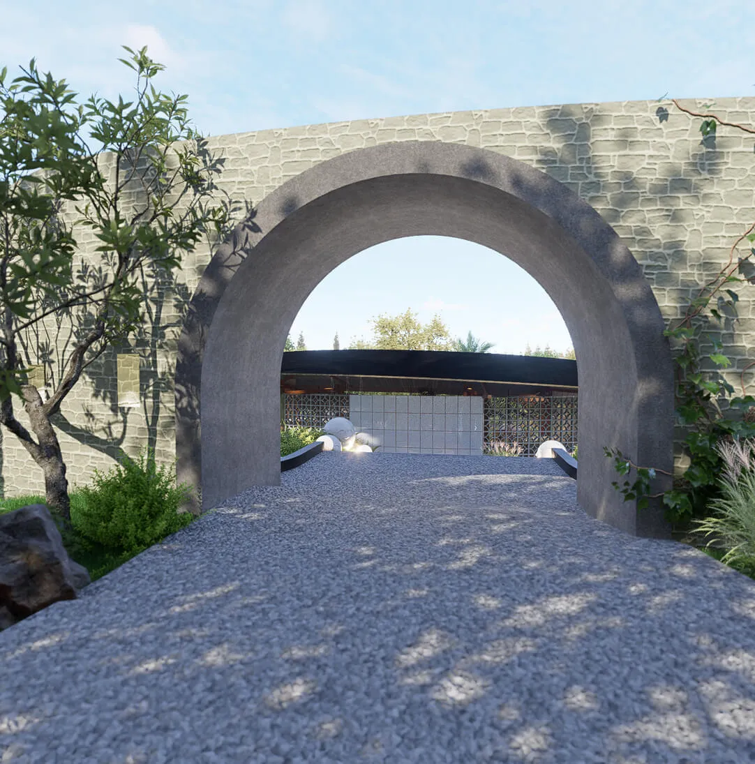 Camino de piedra bajo un arco circular en un jardín